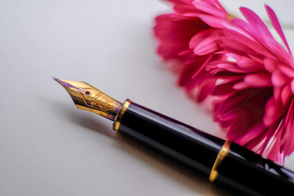 A pen and flower